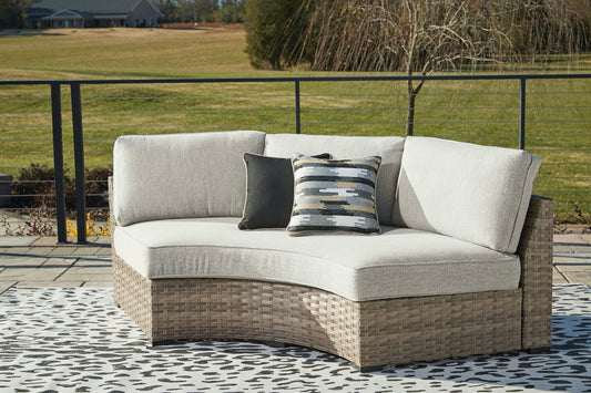Calworth Outdoor Curved Loveseat with Cushion image